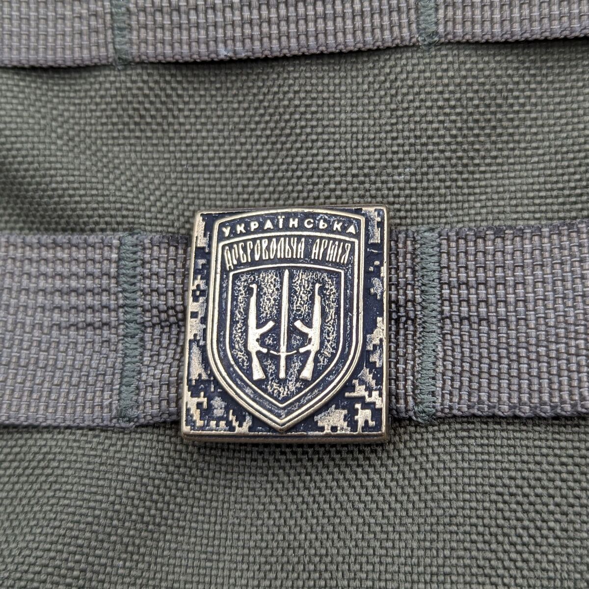 Молле кліпса з емблемою УДА