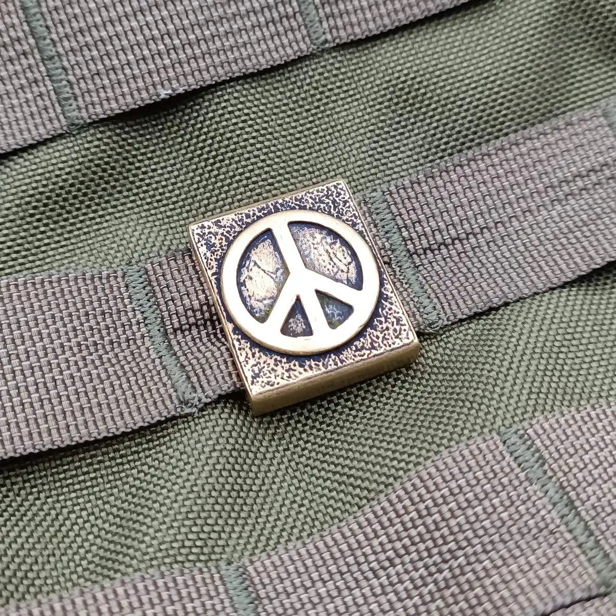 Молле кліпса з символом миру