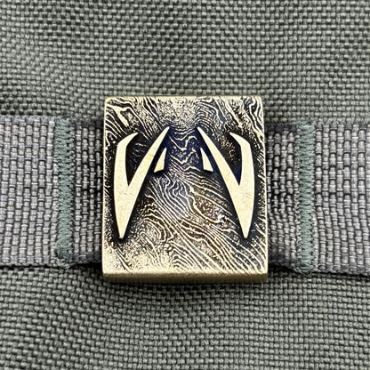 Кліпса на систему MOLLE Очі Джайгу