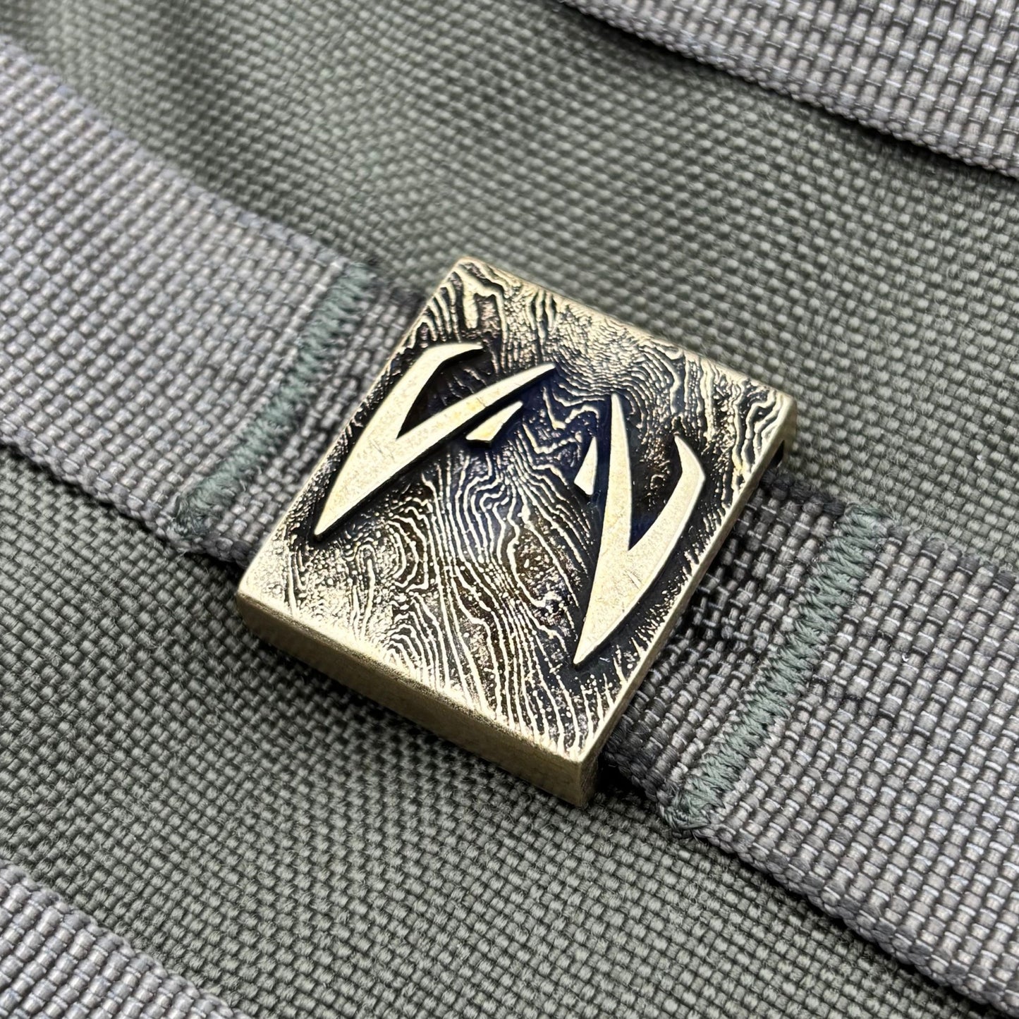 Кліпса на систему MOLLE Очі Джайгу