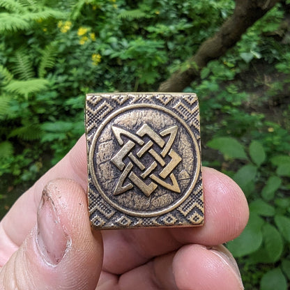 Молле кліпса з символом Сварога