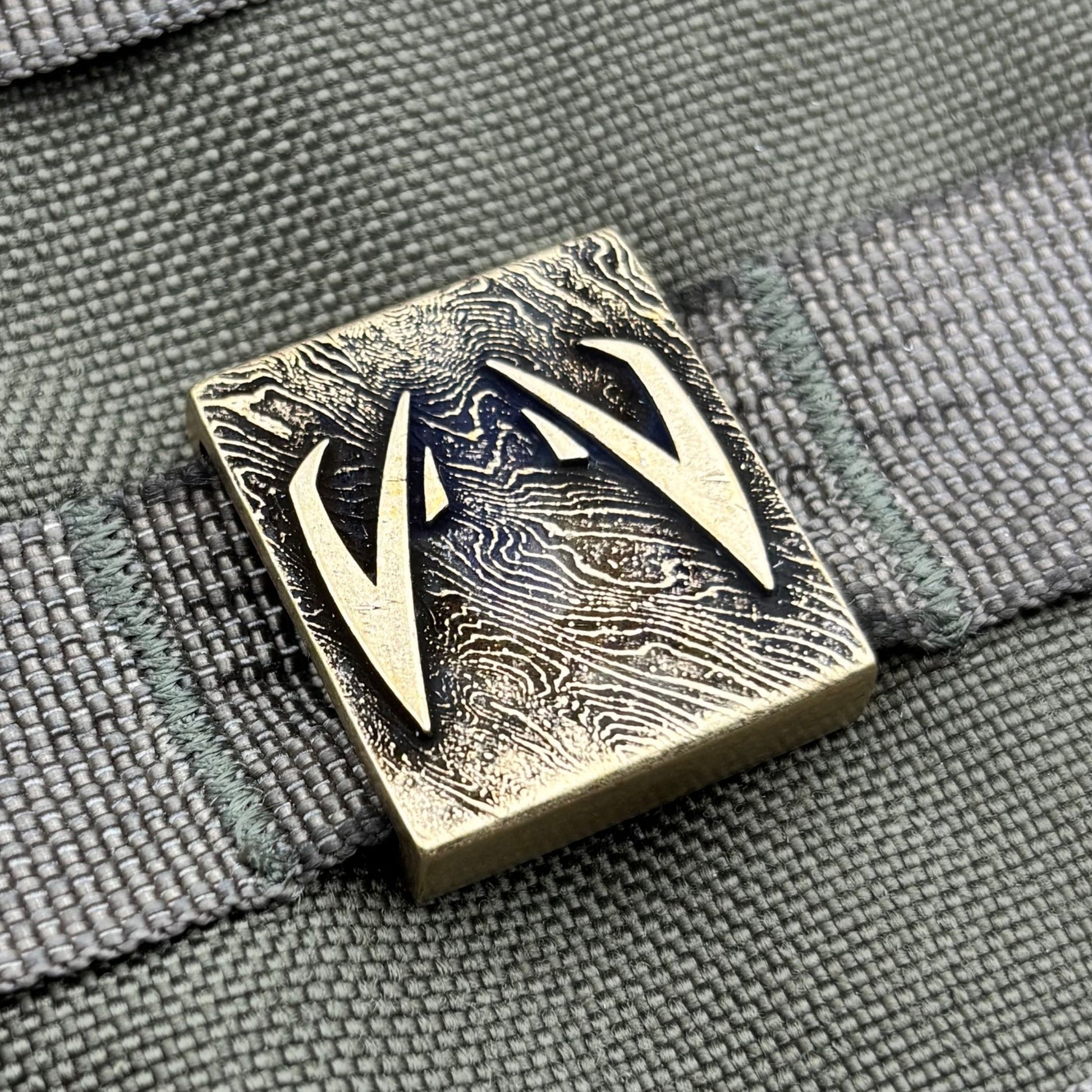 Кліпса на систему MOLLE Очі Джайгу