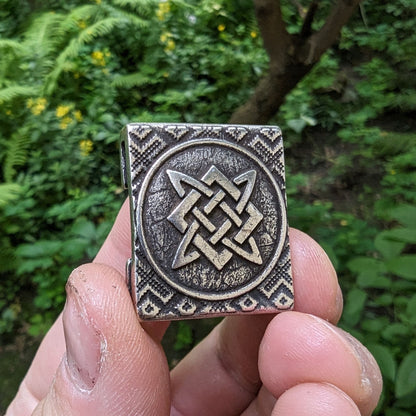 Молле кліпса з символом Сварога