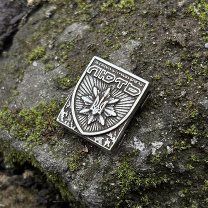 Молле кліпса з емблемою Об'єднаної штурмової бригади Нацполіції України Лють